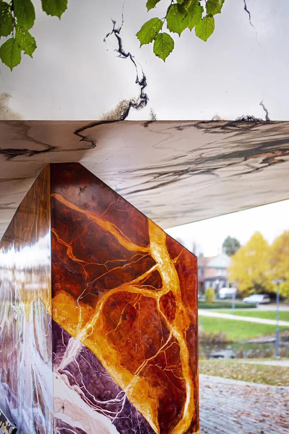 Close-up of the hand-painted red faux marble